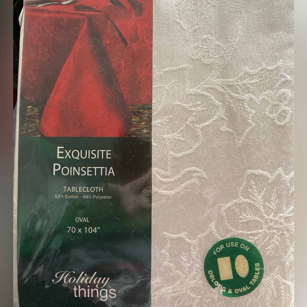 NEW UNOPENED “LINEN N THINGS”BRAND 70” X 104” OVAL SIZE POINSETTIA TABLECLOTH